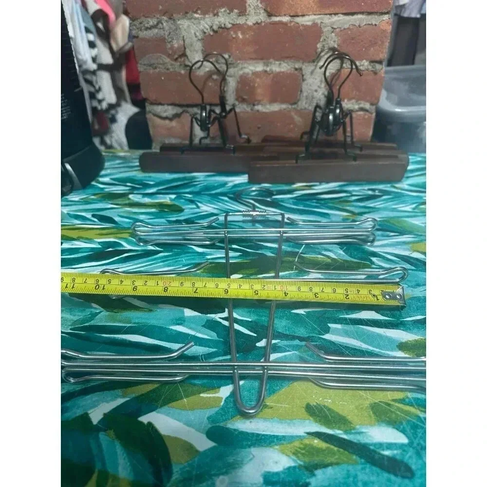 6 Wooden, 1 Metal Clothing Hangers